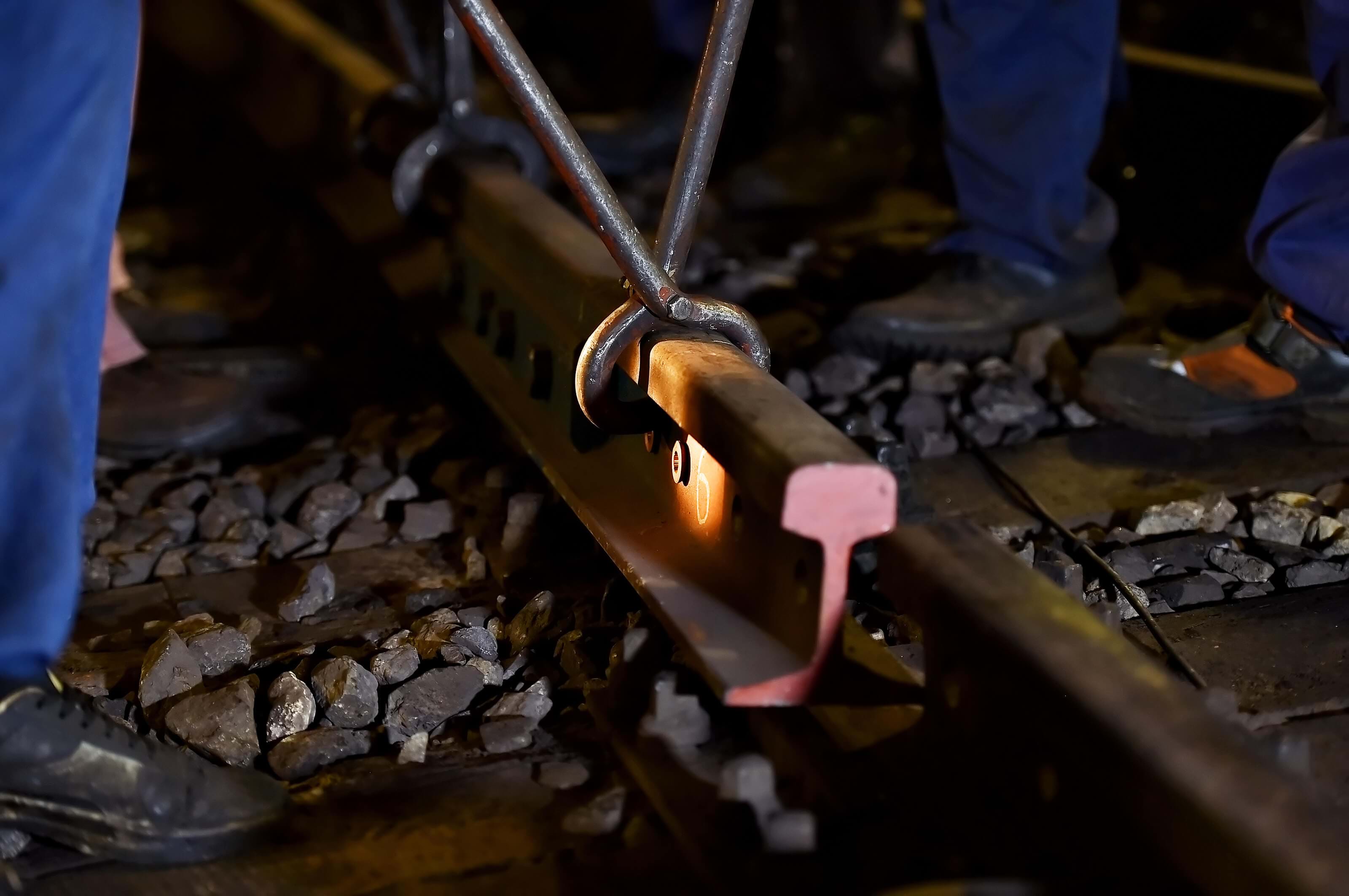 Railway workers work on tracks